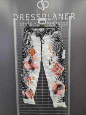 Jogpants Dressplaner wei/schwarz Blume orange
